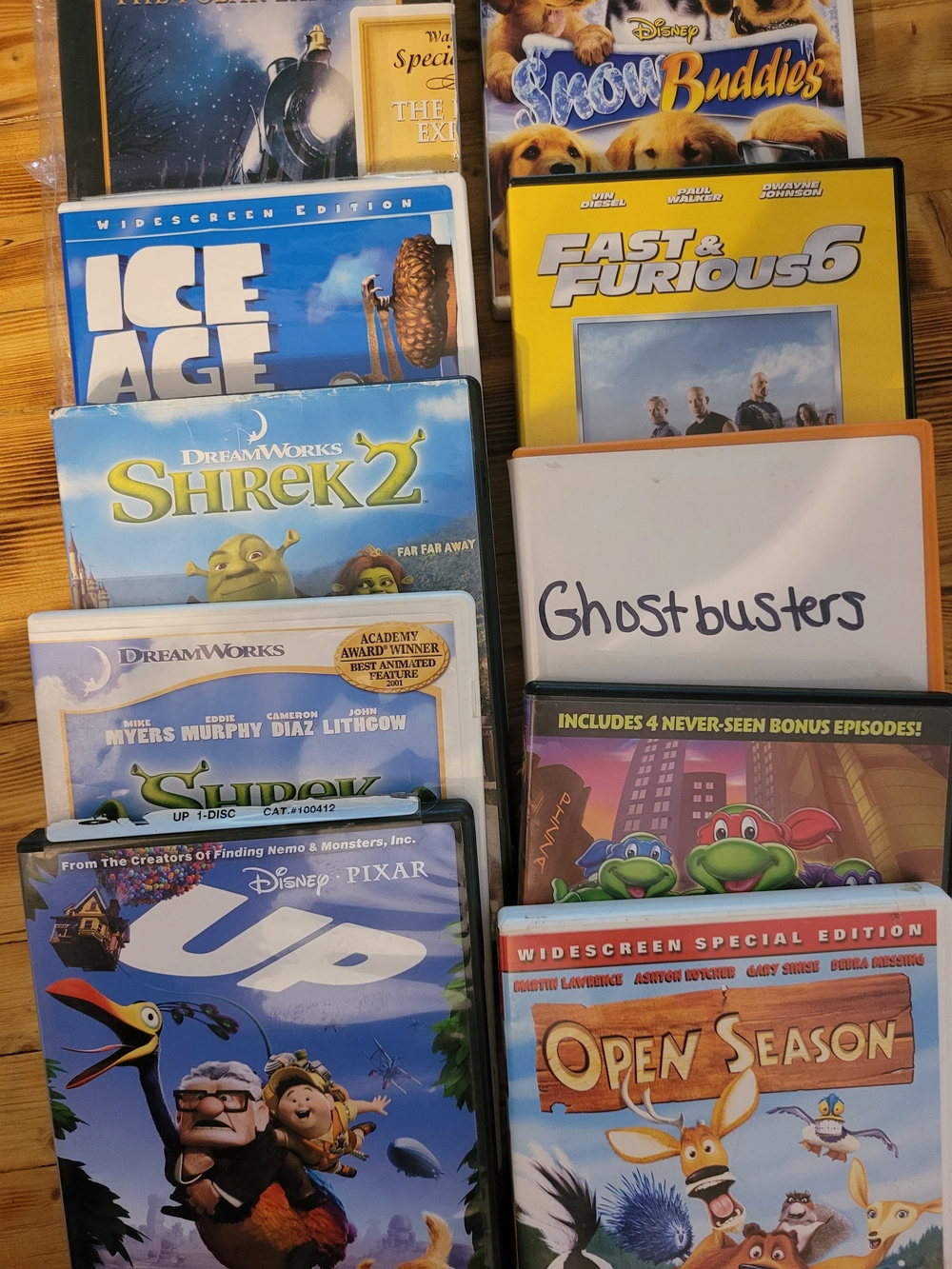 Assorted Family Movie DVDs & Cases - Mixed Brands - Blue, Yellow, White